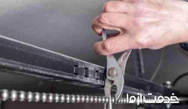 قیمت تعمیر جک درب پارکینگ